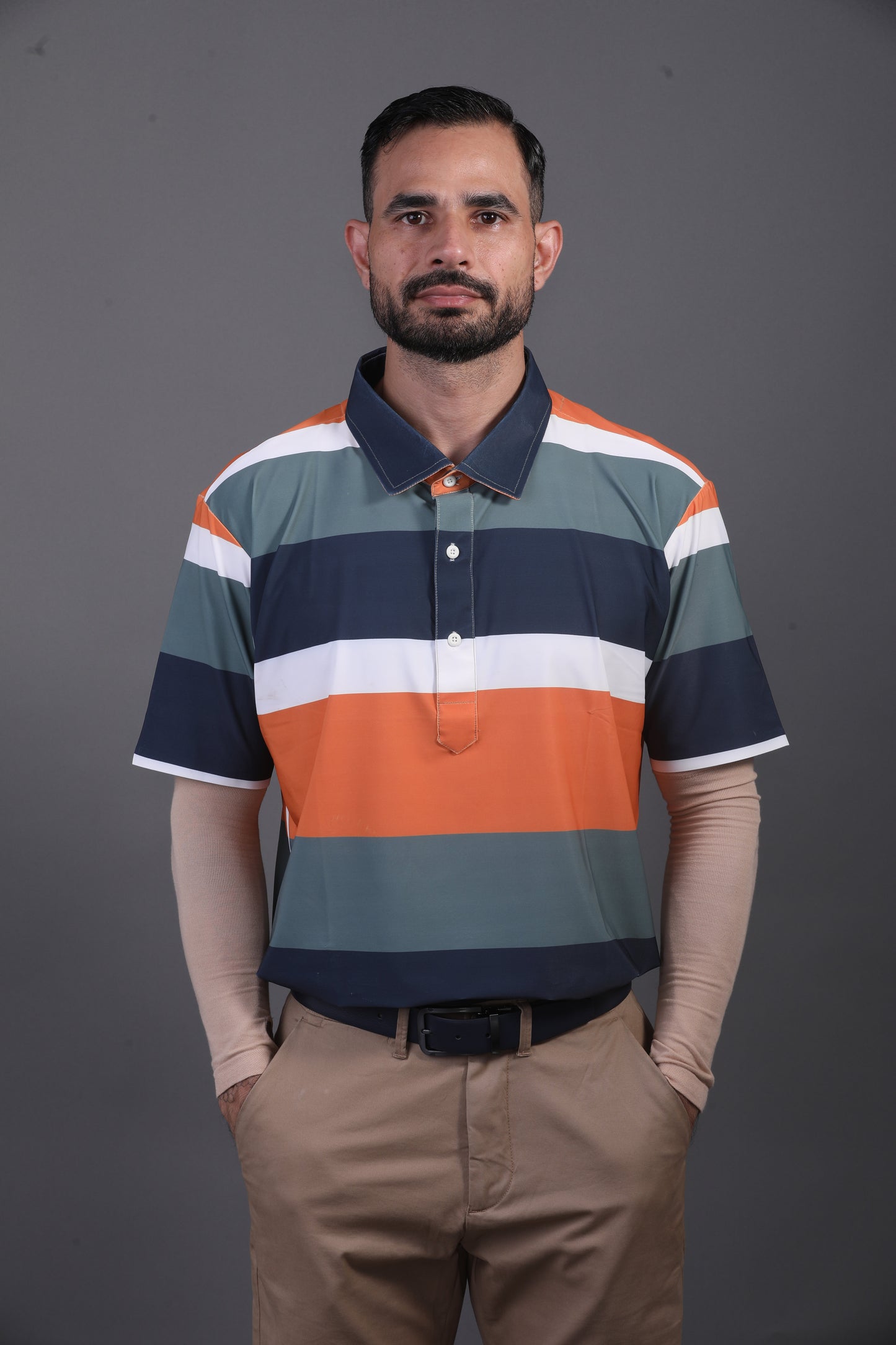 Pure Essential Flex Green Black White Orange Polo