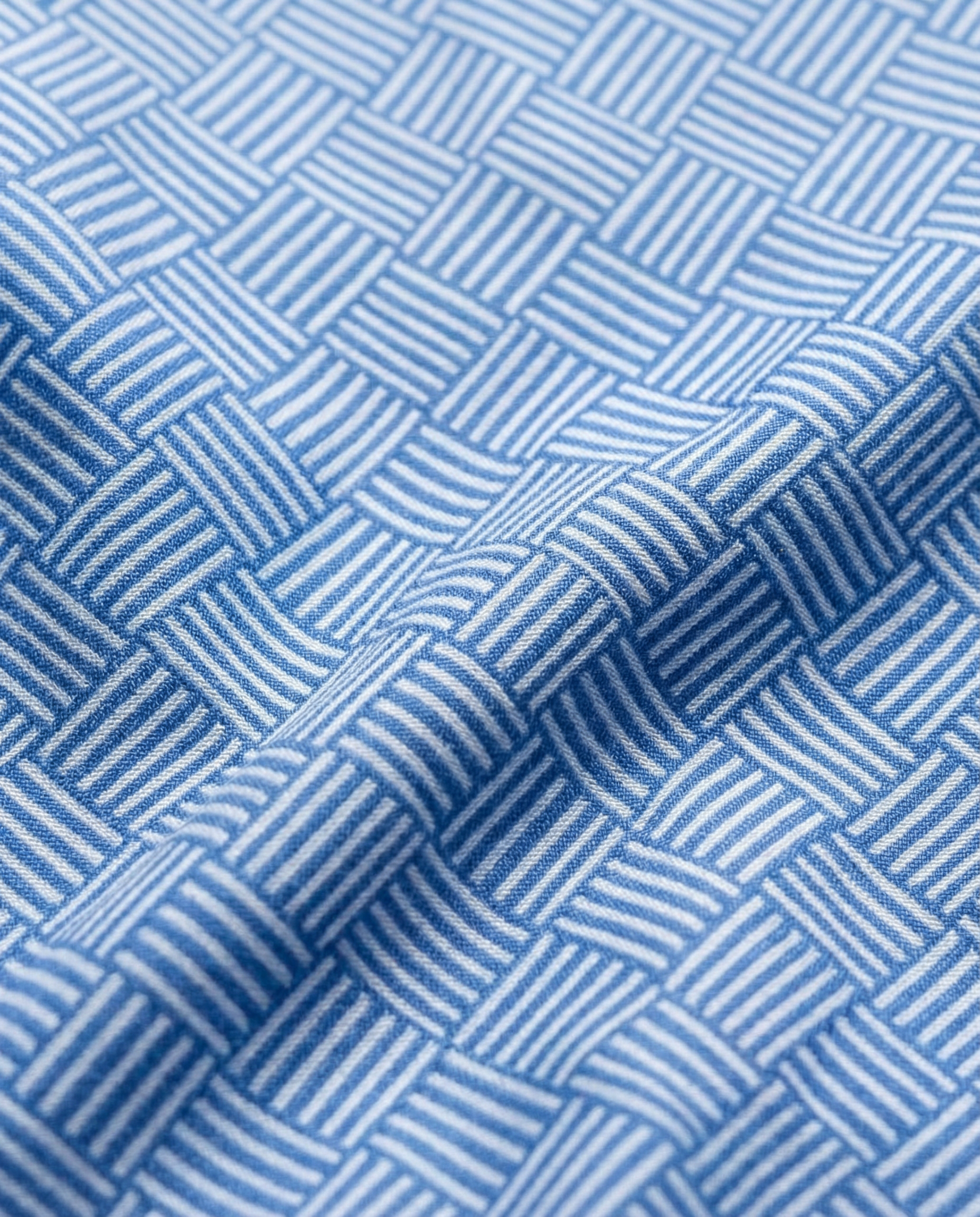 Close-up specialized polyamide fabric texture on DapperTee Italiano Brunetti blue office polo.