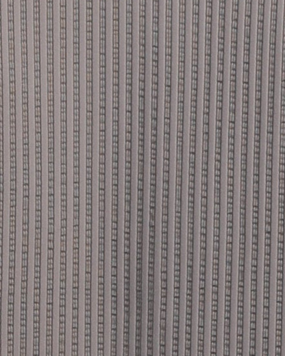 Close-up specialized jacquard stripe polyamide fabric texture on DapperTee khaki office polo.