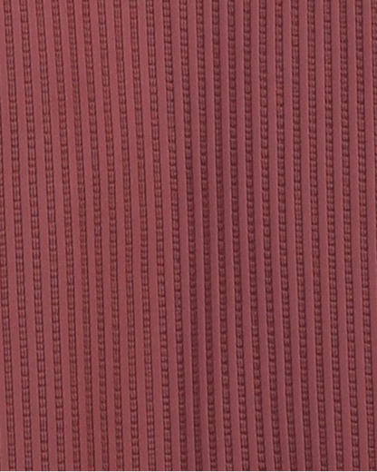 Close-up specialized structured knit polyamide fabric texture on DapperTee brown office polo.