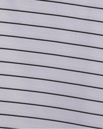 Close-up specialized polyamide fabric texture on DapperTee Regal white black striped polo.