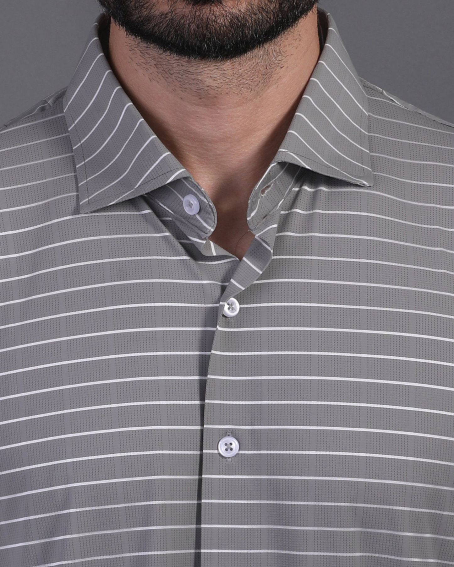 DapperTee striped open polo highlighting professional open collar and premium tailored fit.
