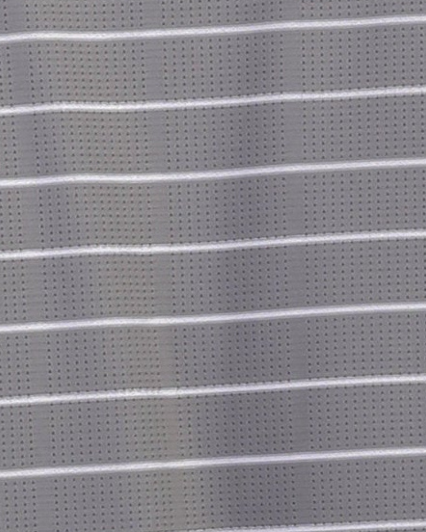 Close-up specialized polyamide fabric texture on DapperTee Prestige striped premium office polo.
