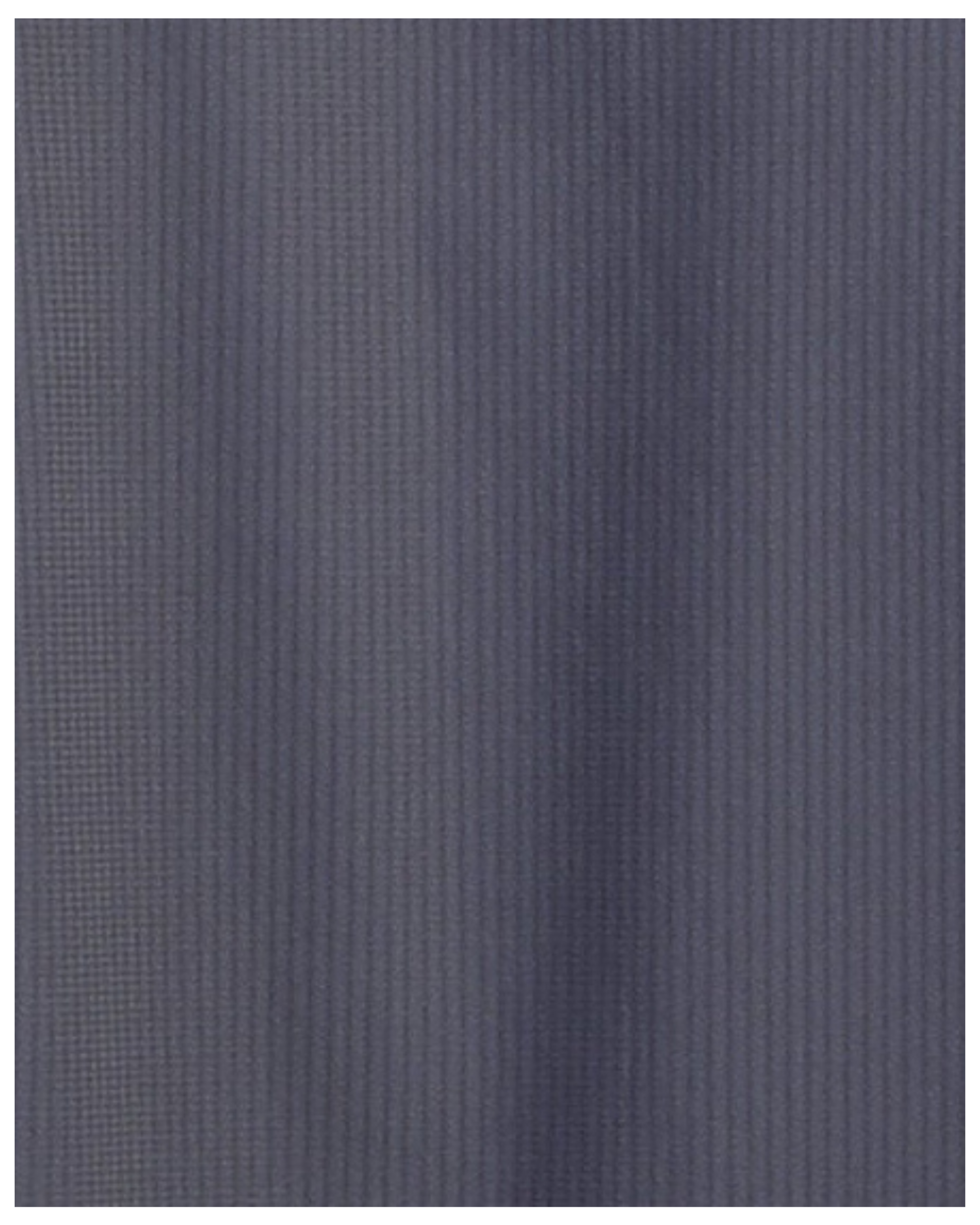 Close-up specialized jacquard polyamide fabric texture on DapperTee charcoal premium office polo.