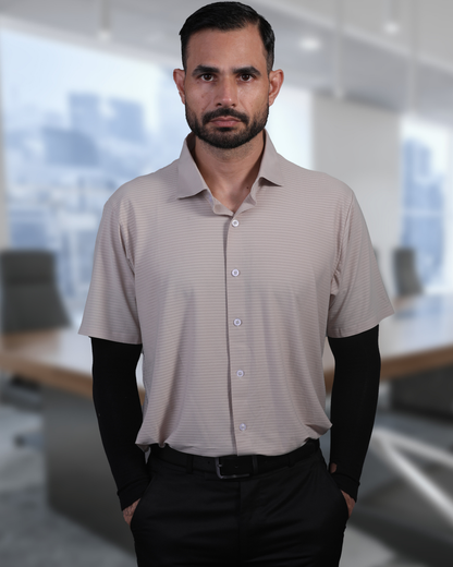 Model wearing DapperTee beige open polo for a premium corporate boardroom aesthetic.