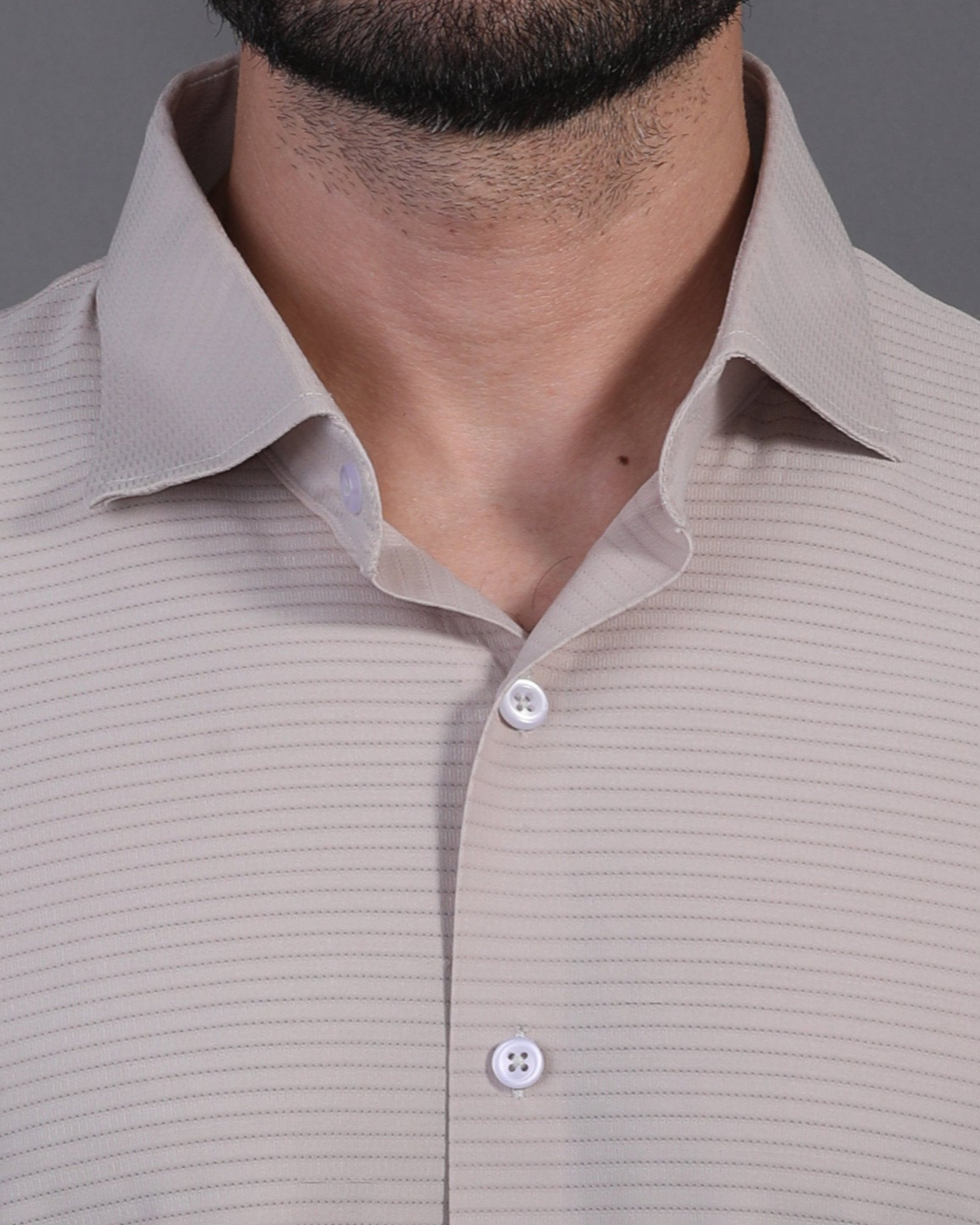 DapperTee beige open polo highlighting firm collar and professional high-end tailored fit.