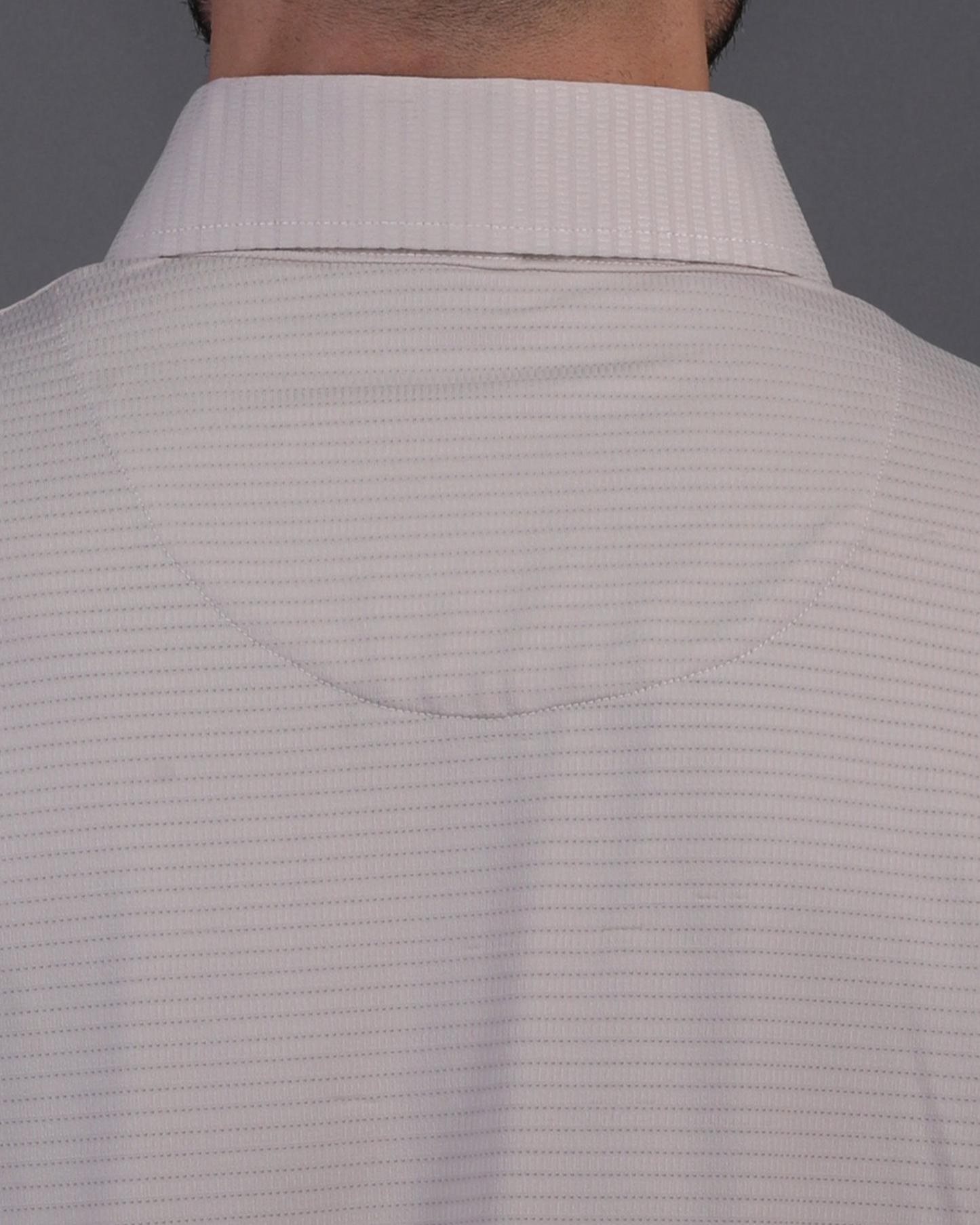 DapperTee beige jacquard polo featuring professional back yoke and premium tapered fit.