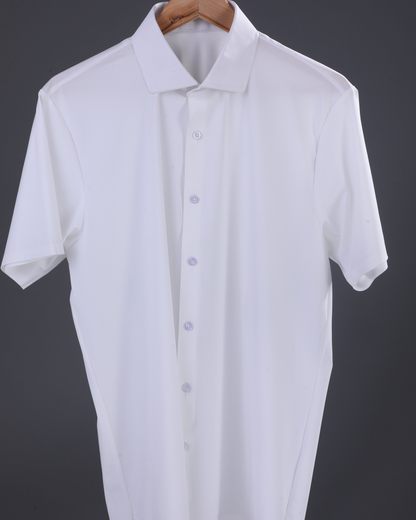 DapperTee white open polo highlighting professional open collar and premium tailored fit.
