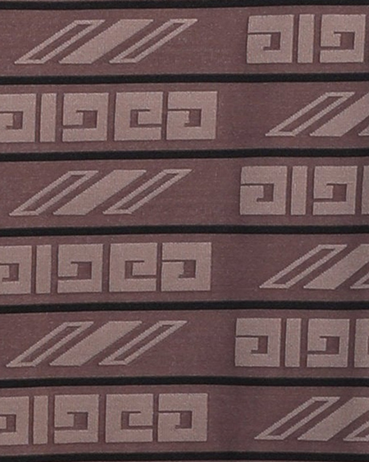 Close-up specialized jacquard polyamide fabric texture on DapperTee brown premium office polo.