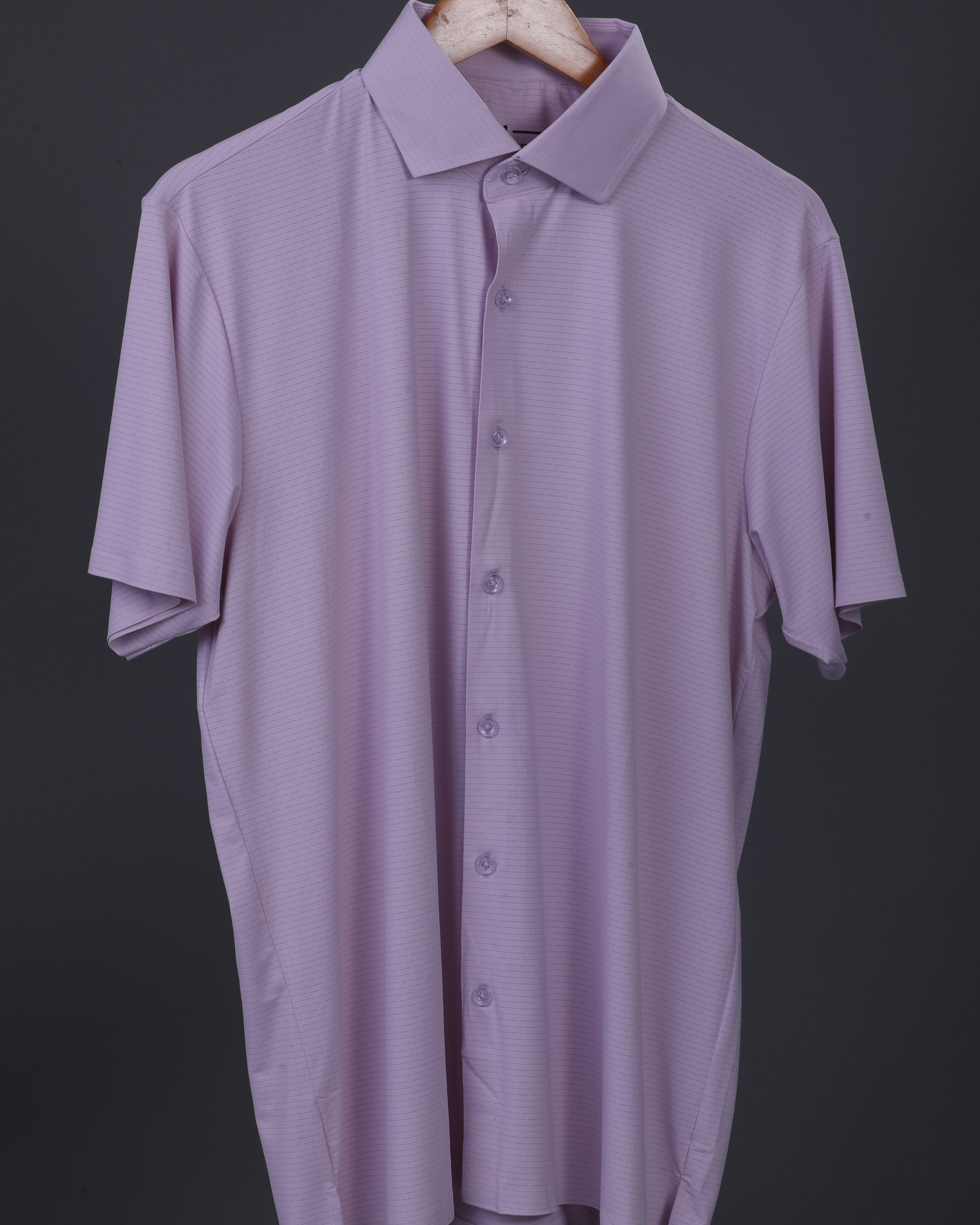 DapperTee pink open polo highlighting professional open collar and premium tailored fit.