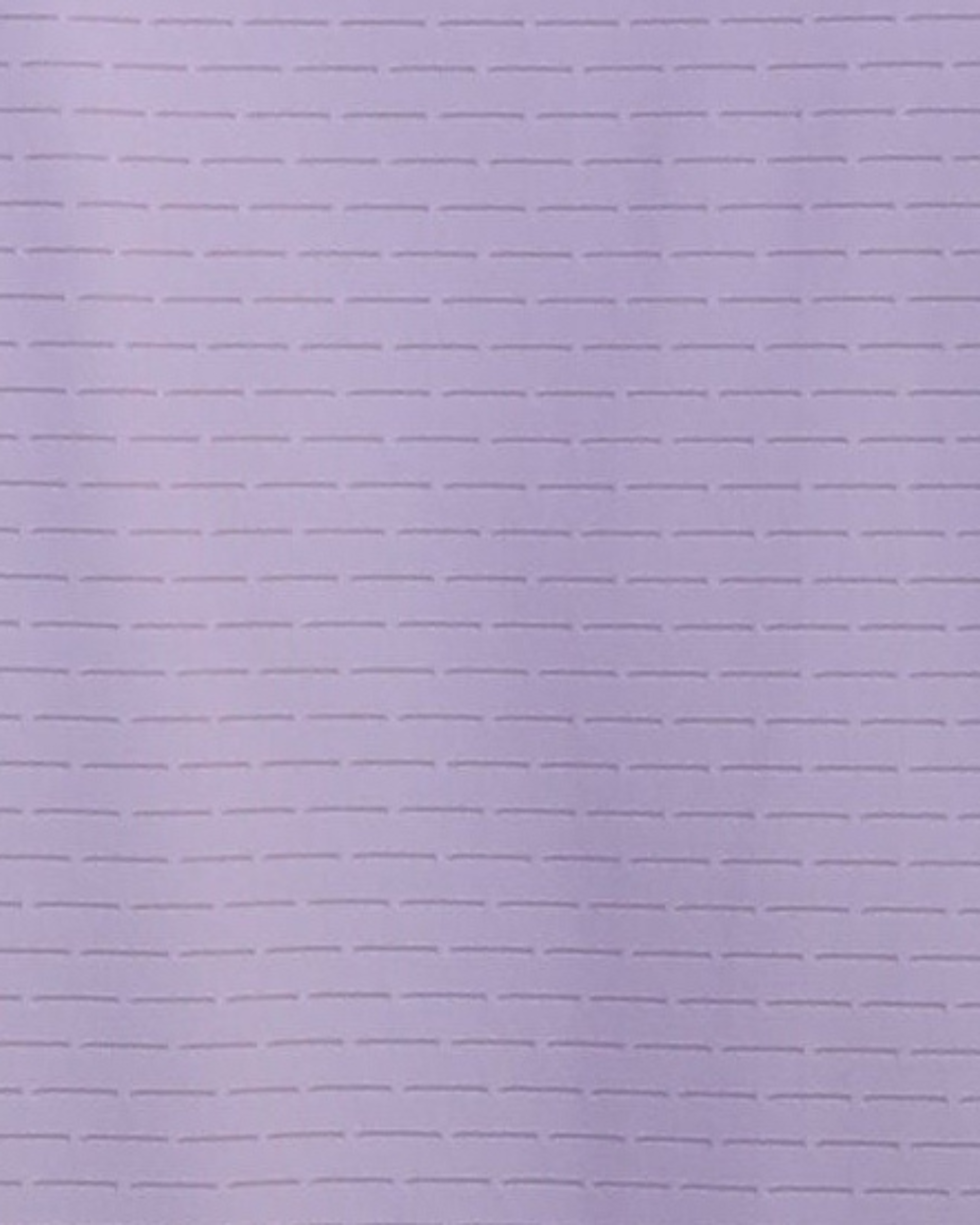 Close-up specialized jacquard polyamide fabric texture on DapperTee pink premium office polo.