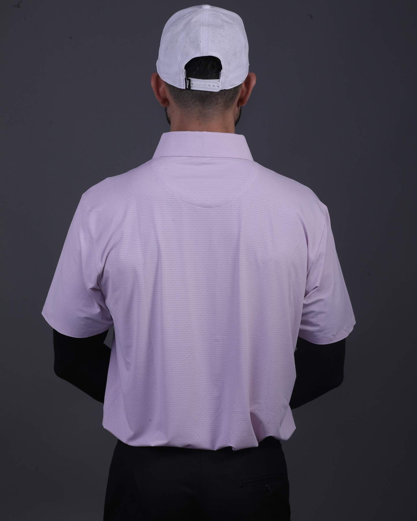 DapperTee pink open polo styled for high-end professional environments and corporate leadership.