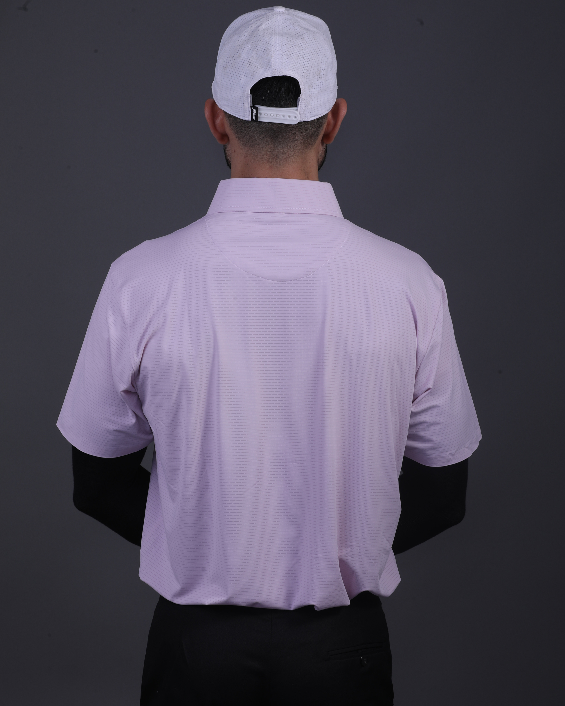 DapperTee pink open polo styled for high-end professional environments and corporate leadership.