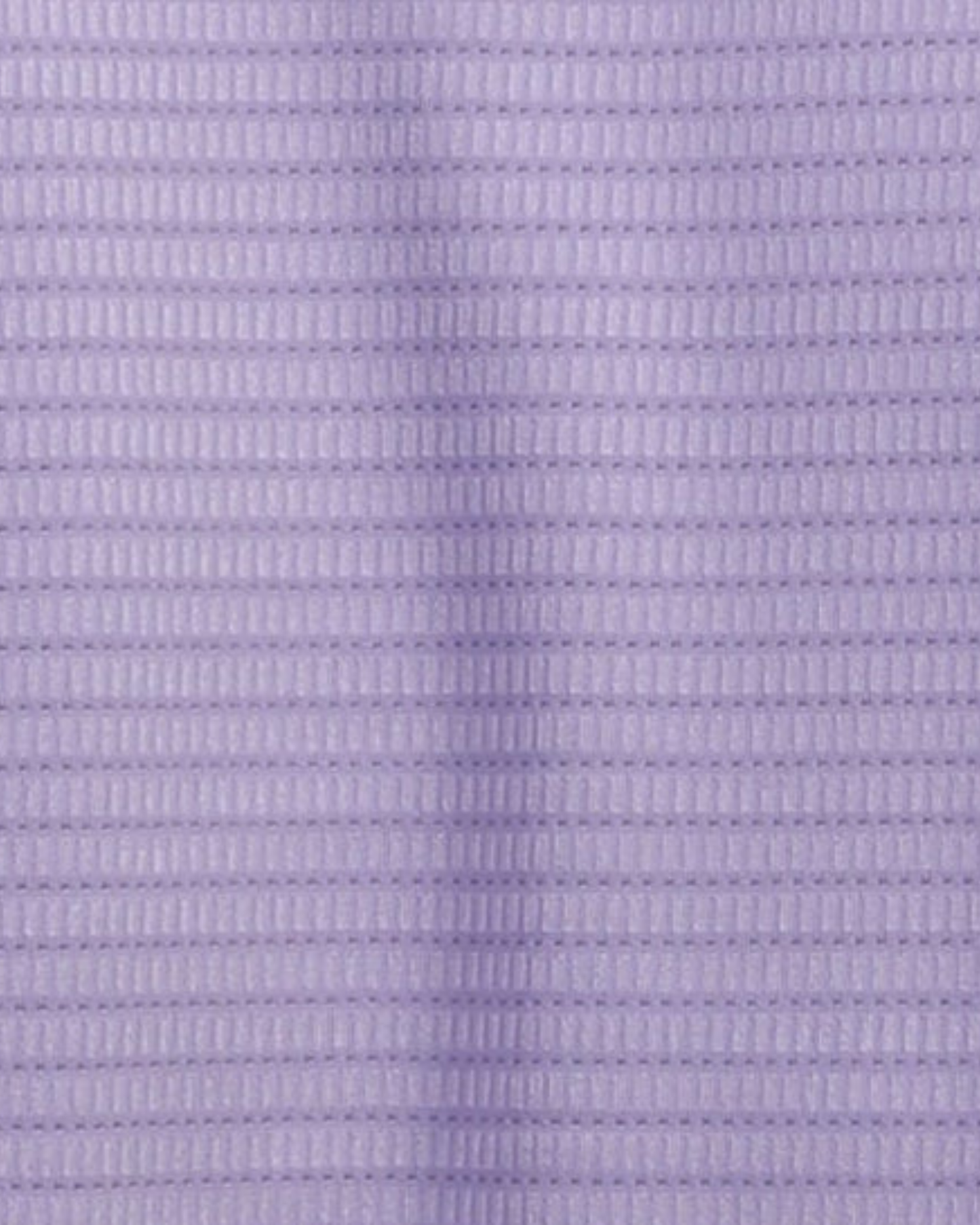 Close-up specialized jacquard polyamide fabric texture on DapperTee lavender premium office polo.