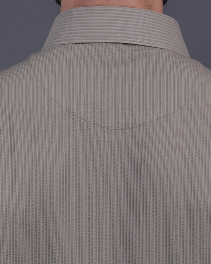 DapperTee khaki striped polo featuring professional back yoke and premium tapered fit.