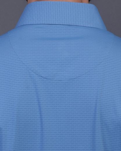 DapperTee blue striped polo featuring professional back yoke and premium tapered fit.