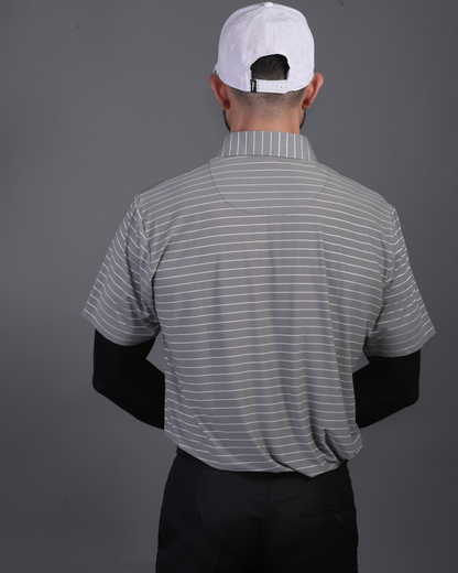 DapperTee grey striped polo styled for high-end professional environments and corporate leadership.