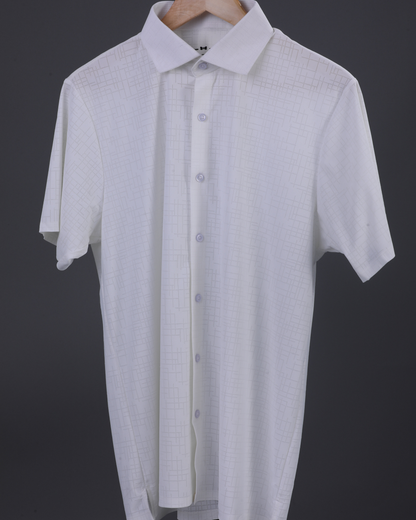 DapperTee white open polo highlighting professional open collar and premium tailored fit.