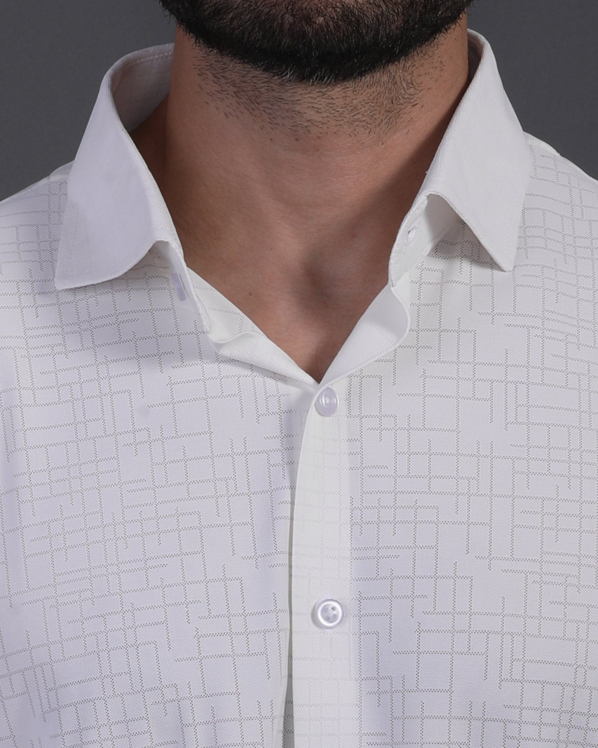 DapperTee white open polo highlighting firm collar and professional high-end tailored fit.