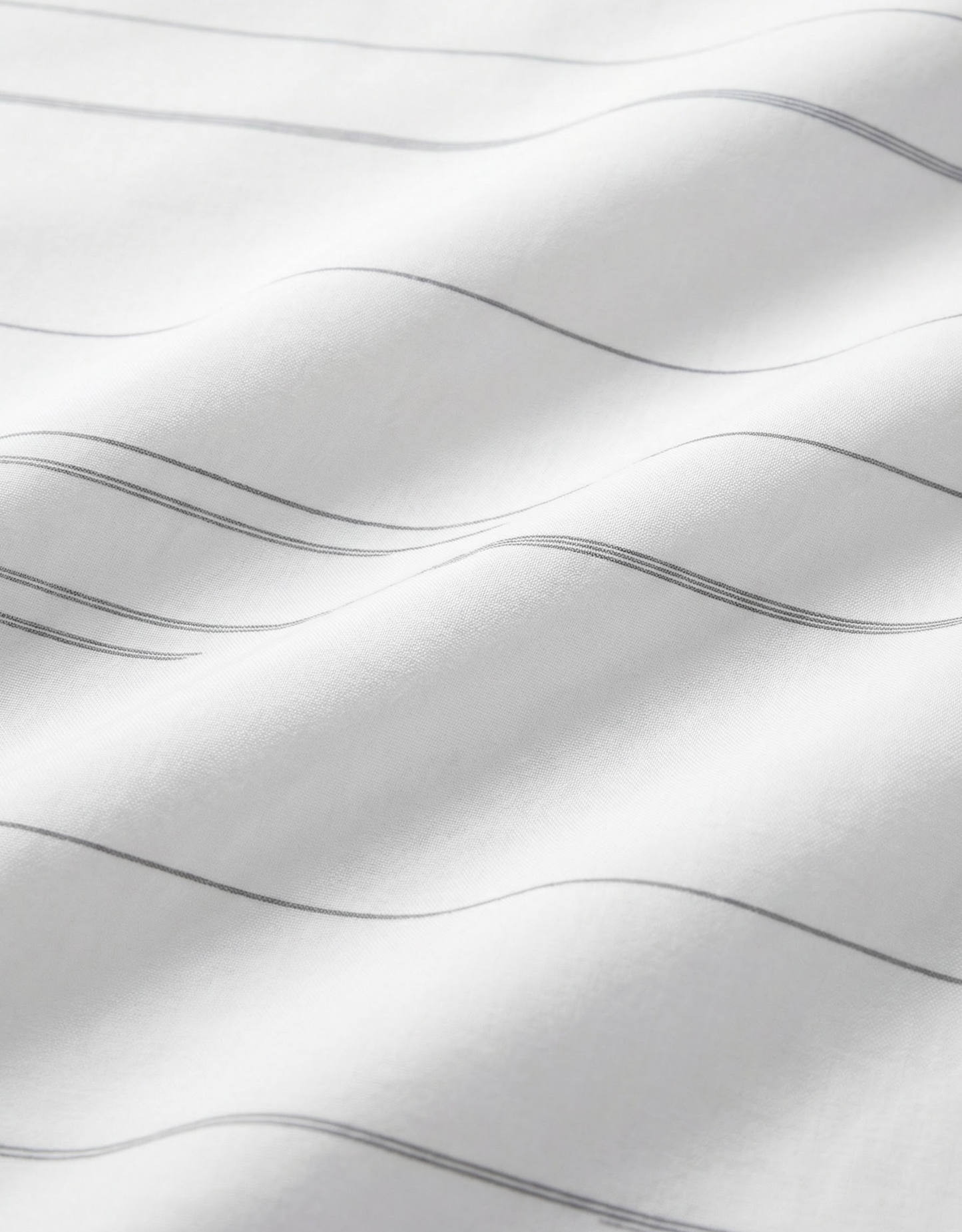 Close-up specialized polyamide fabric texture on DapperTee Icelandic Elegant striped office polo.
