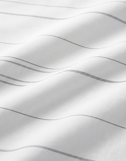 Close-up specialized polyamide fabric texture on DapperTee Icelandic Elegant striped office polo.