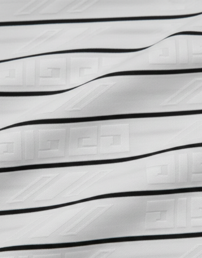 Close-up specialized jacquard polyamide fabric texture on DapperTee Italian designer striped polo.