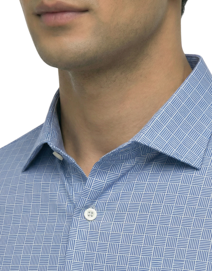 DapperTee blue jacquard long sleeve polo highlighting firm collar and professional fit.
