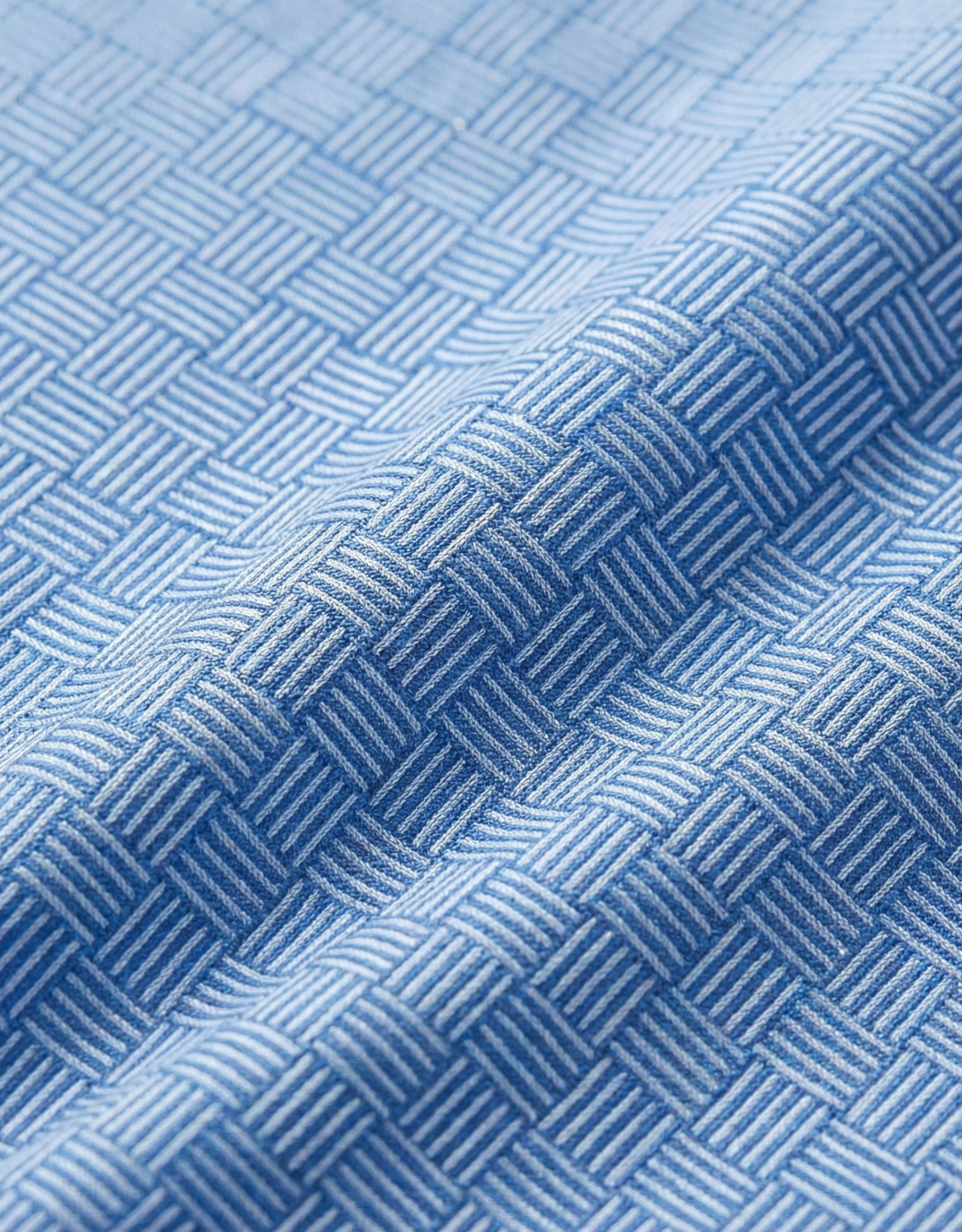 Close-up specialized jacquard polyamide fabric texture on DapperTee Swede Blue office polo.