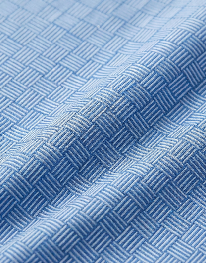Close-up specialized jacquard polyamide fabric texture on DapperTee Swede Blue office polo.
