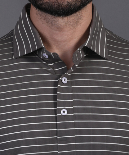 DapperTee black striped polo highlighting firm collar and professional high-end tailored fit.