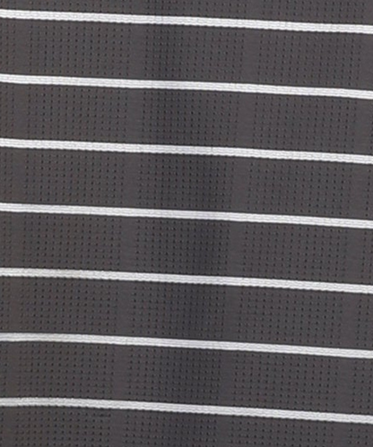 Close-up specialized jacquard stripe polyamide fabric texture on DapperTee black office polo.