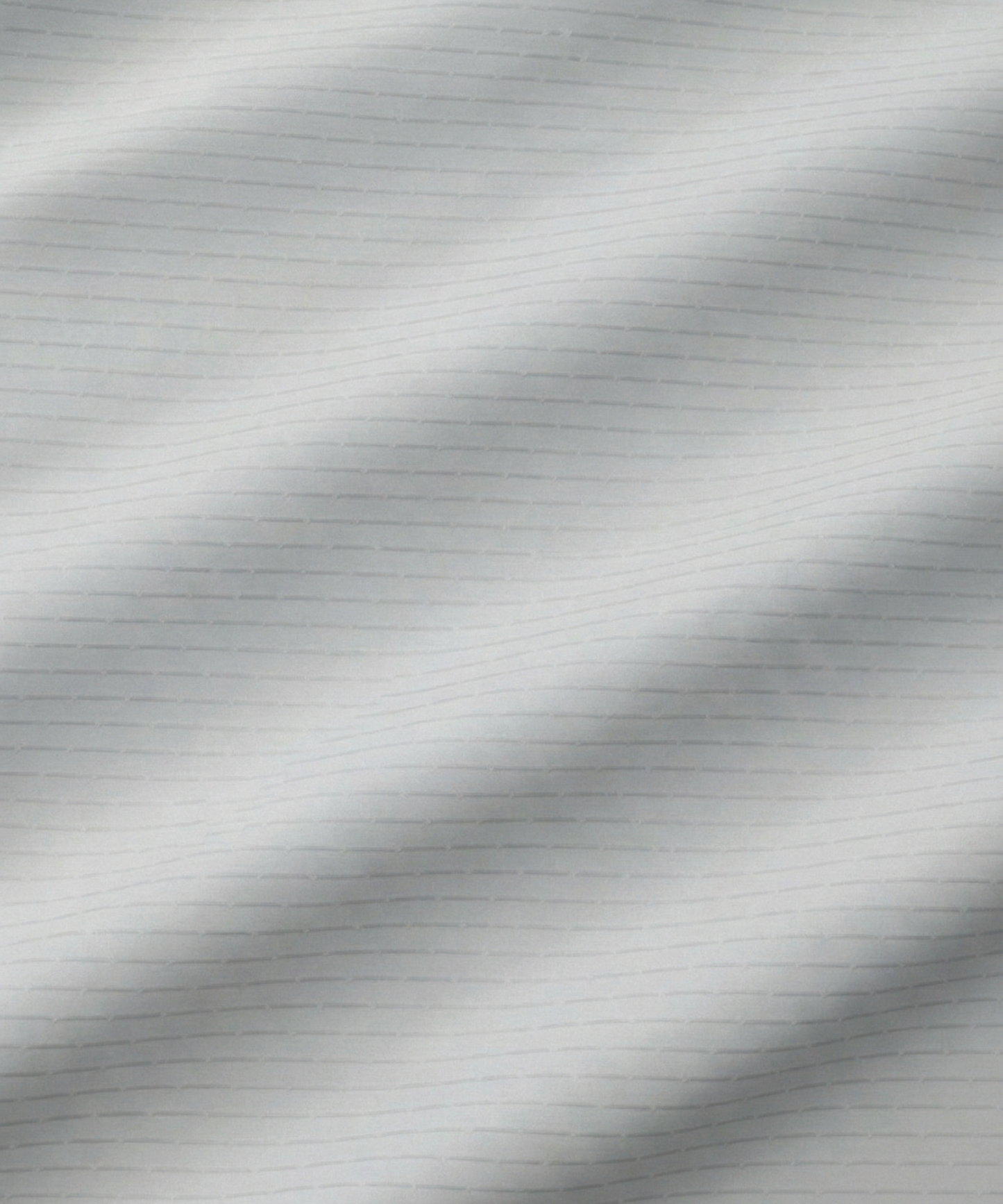 Close-up specialized jacquard polyamide fabric texture on DapperTee Icelandic white striper shirt.