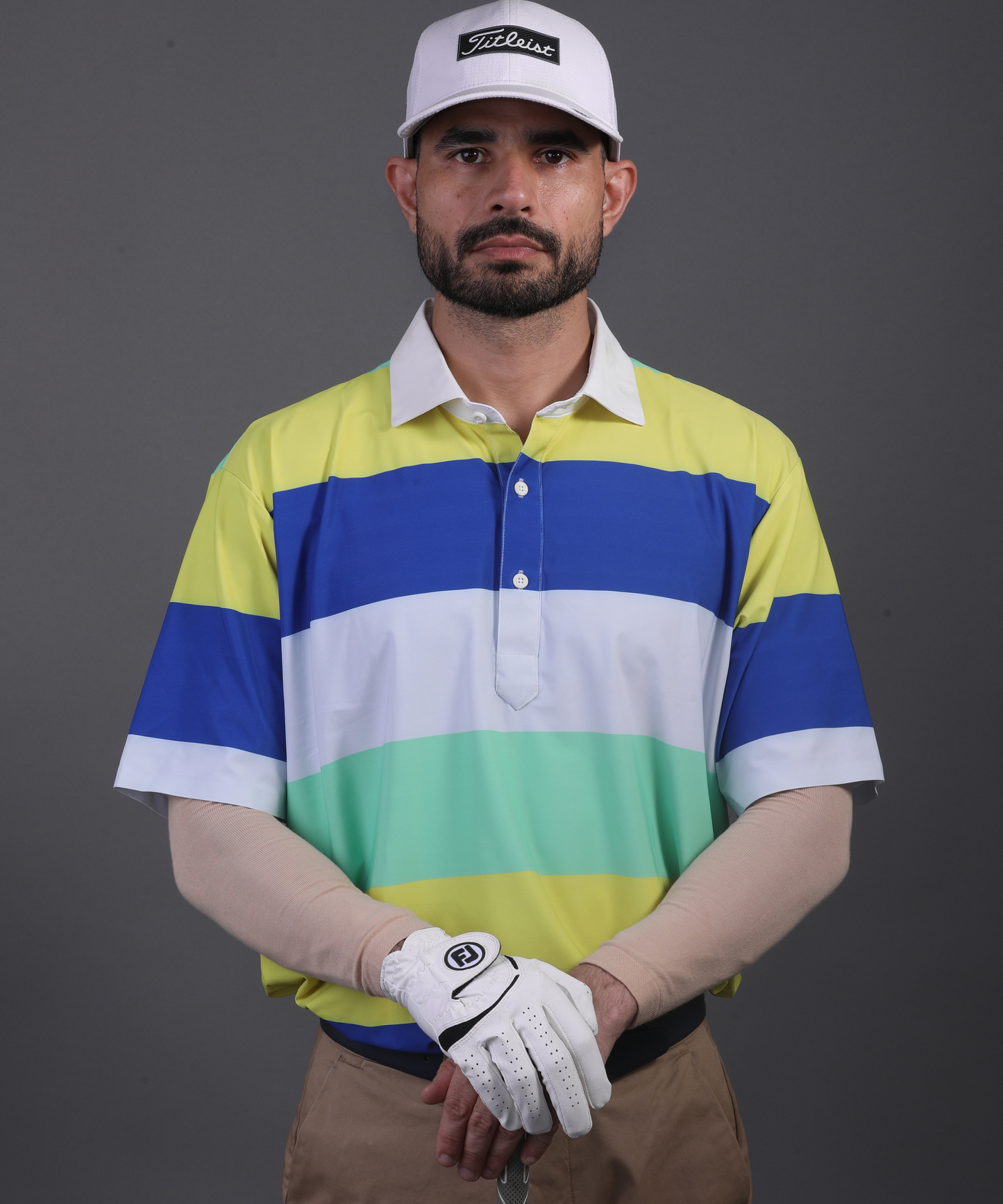 Men’s DapperTee colorful golf polo breathable polyamide fabric professional athletic performance gear.