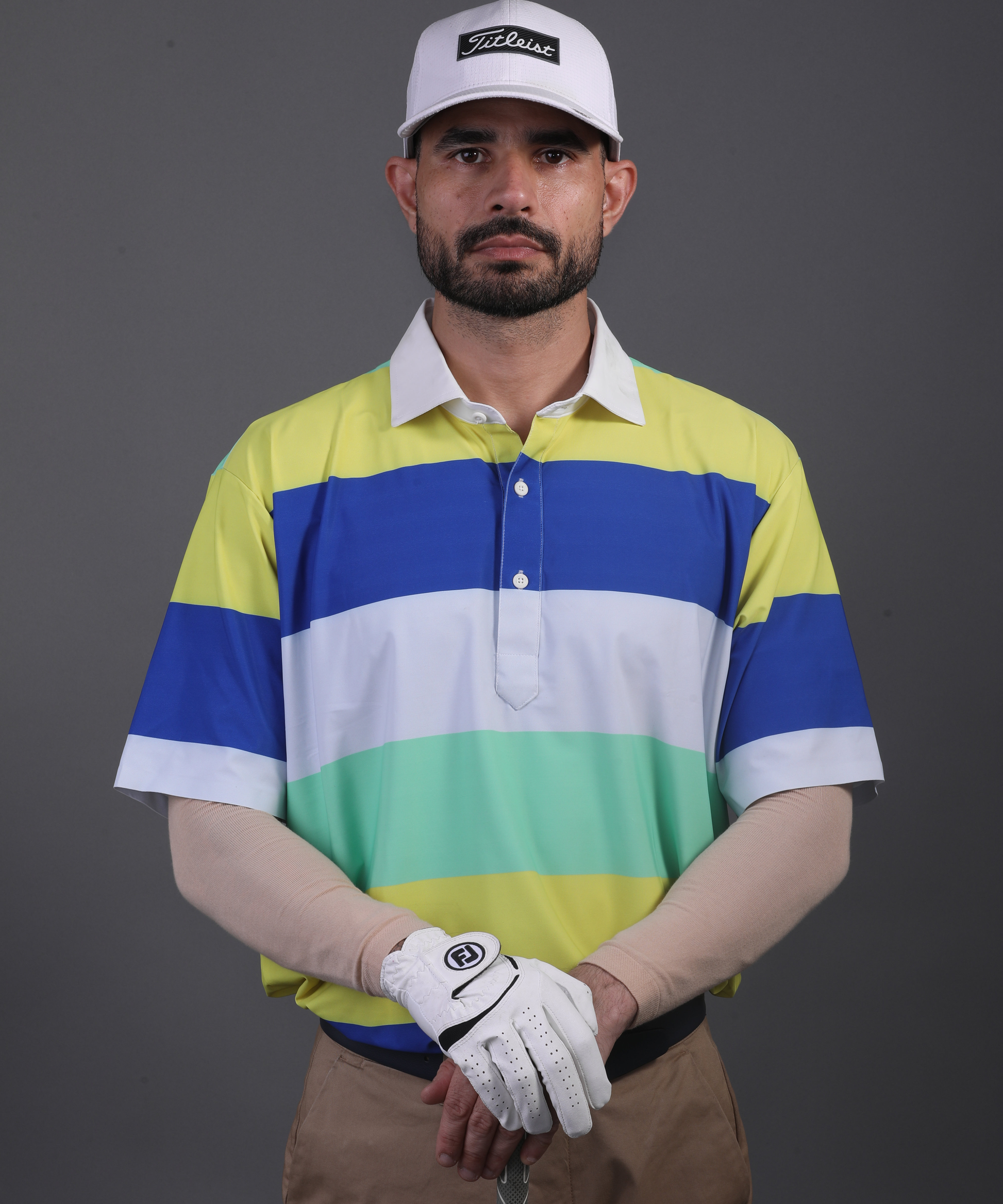 Men’s DapperTee colorful golf polo breathable polyamide fabric professional athletic performance gear.