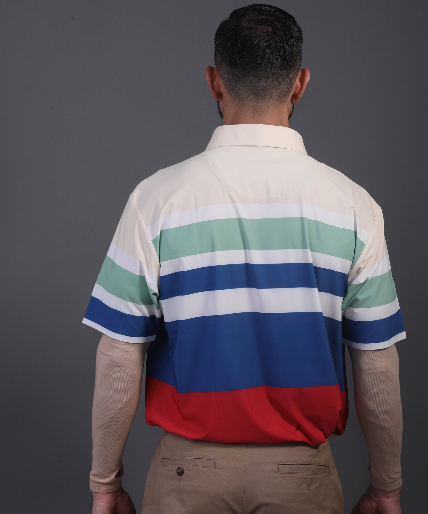 DapperTee Super Essential polo showcasing relaxed fit for professional men’s athletic style.
