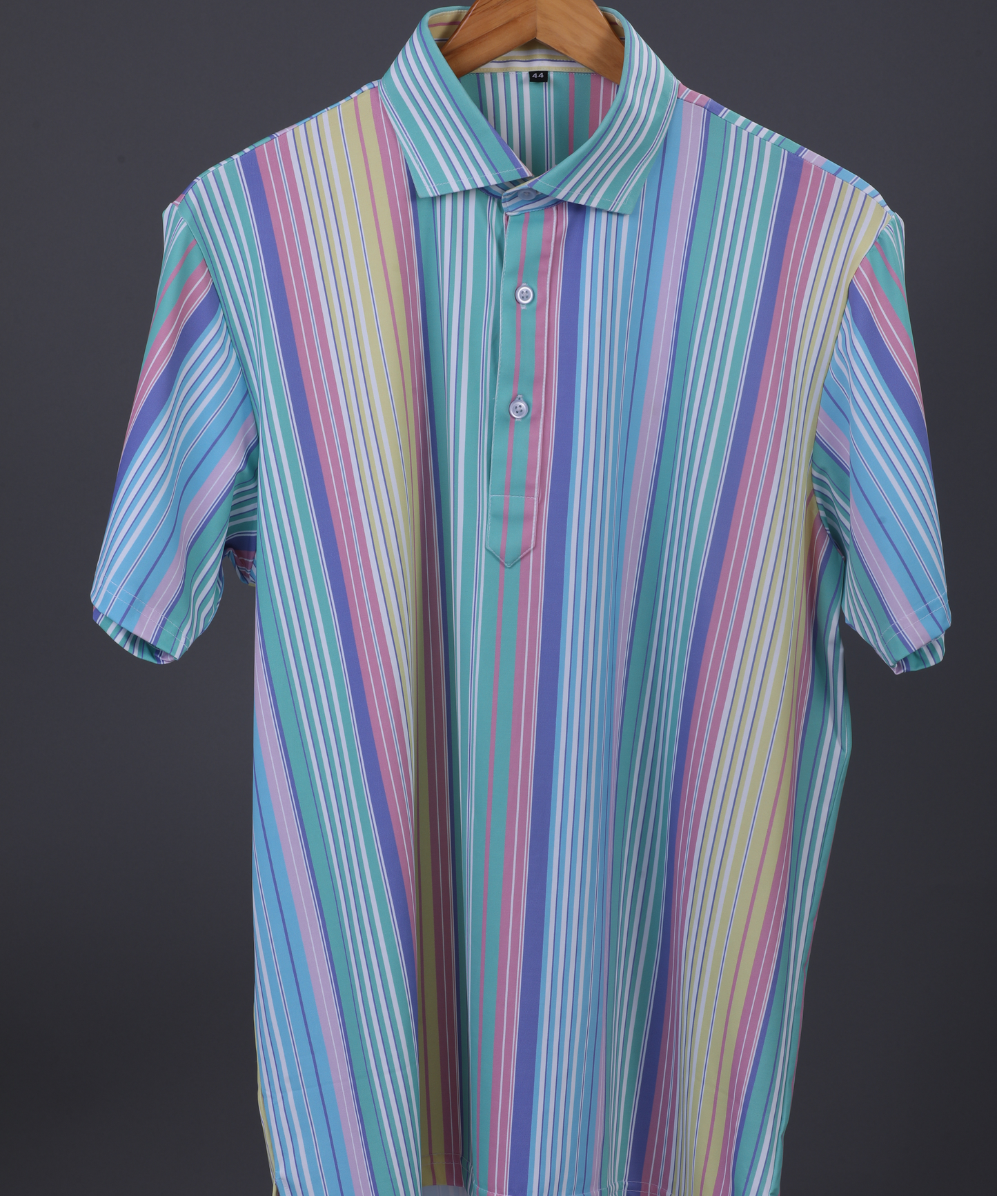 Vertical Luxe Stripes DapperTee polo highlighting specialized fabric and firm collar construction.