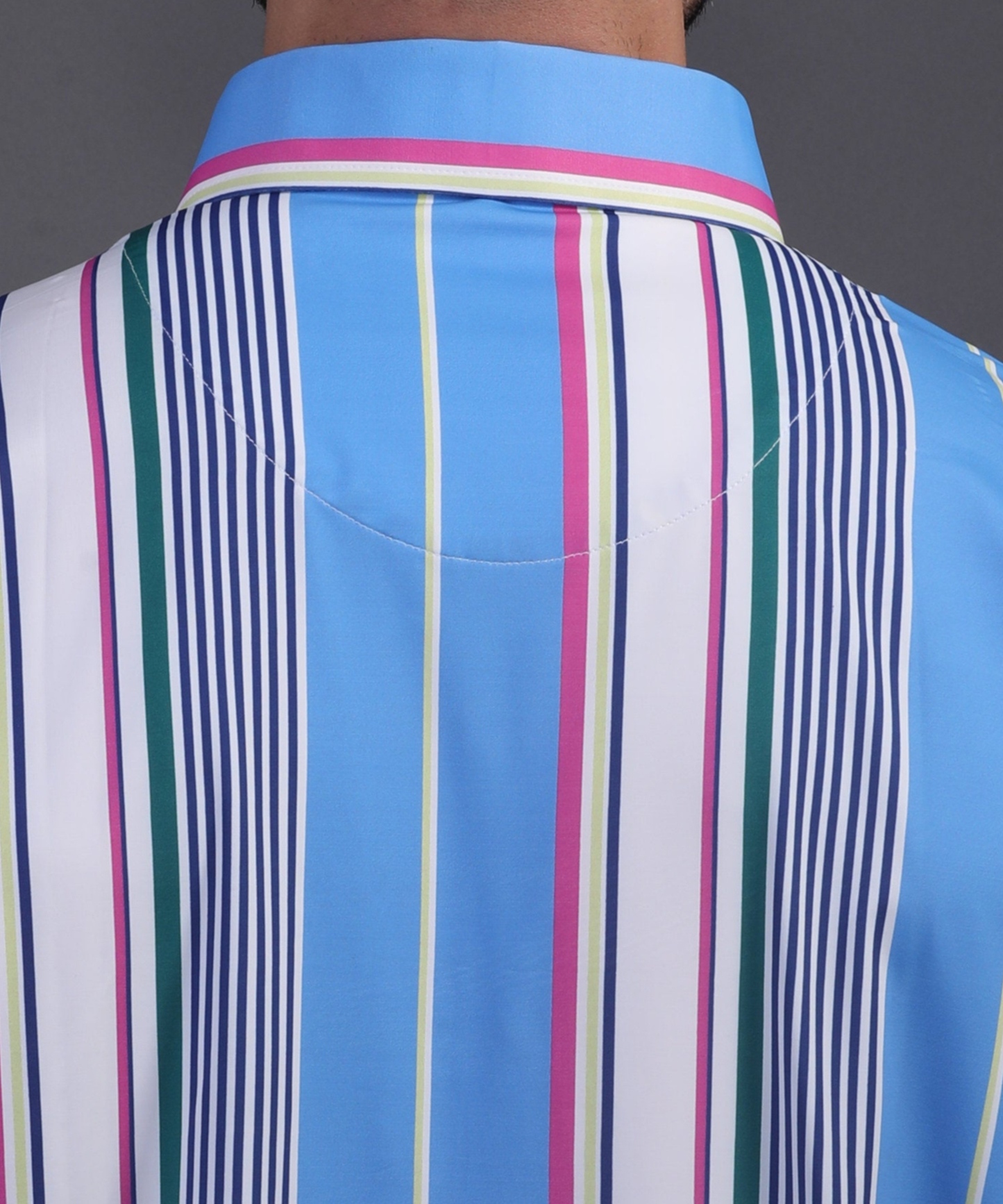 High-quality DapperTee firm collar construction on vertical stripe blue golf polo.