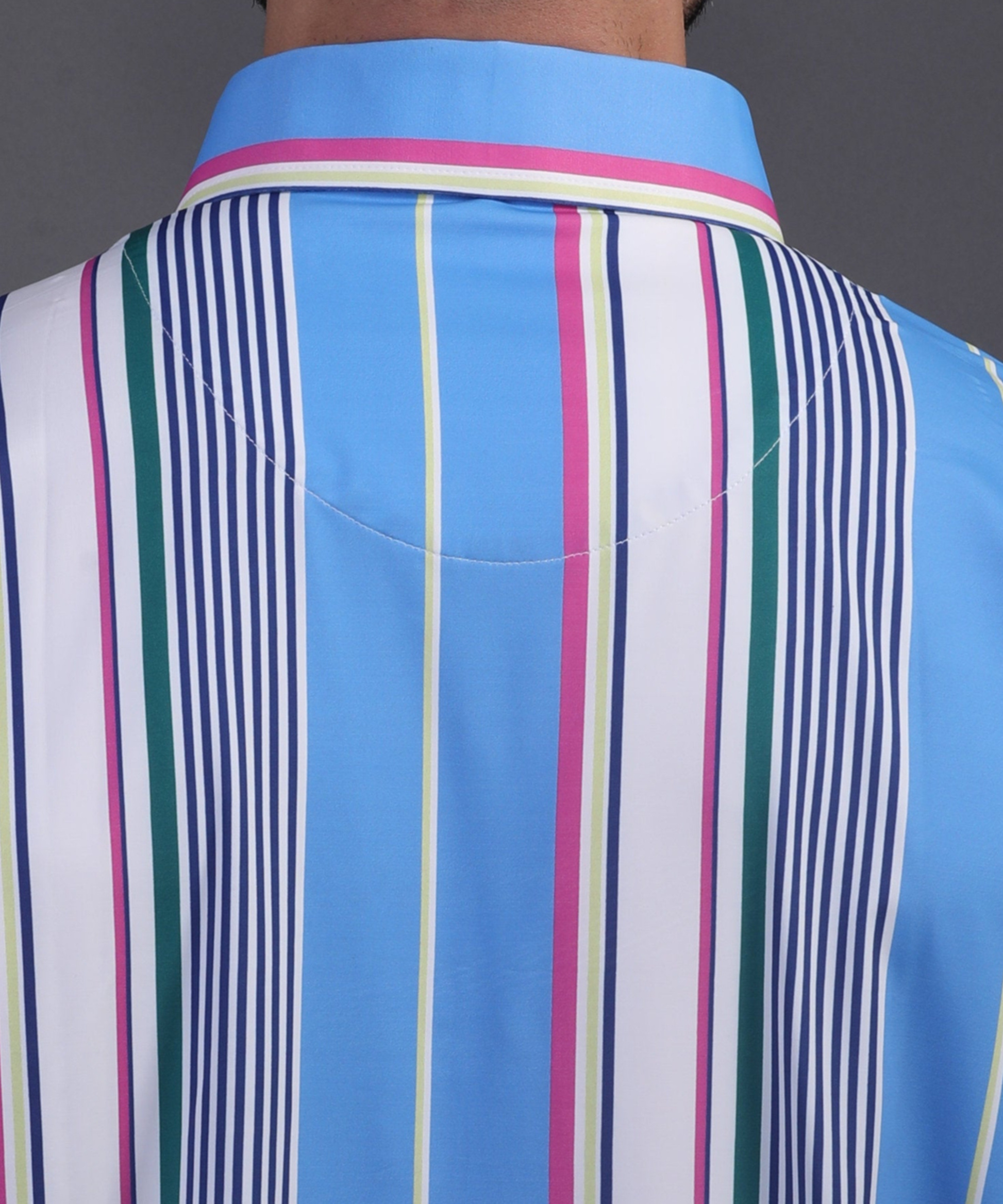 High-quality DapperTee firm collar construction on vertical stripe blue golf polo.