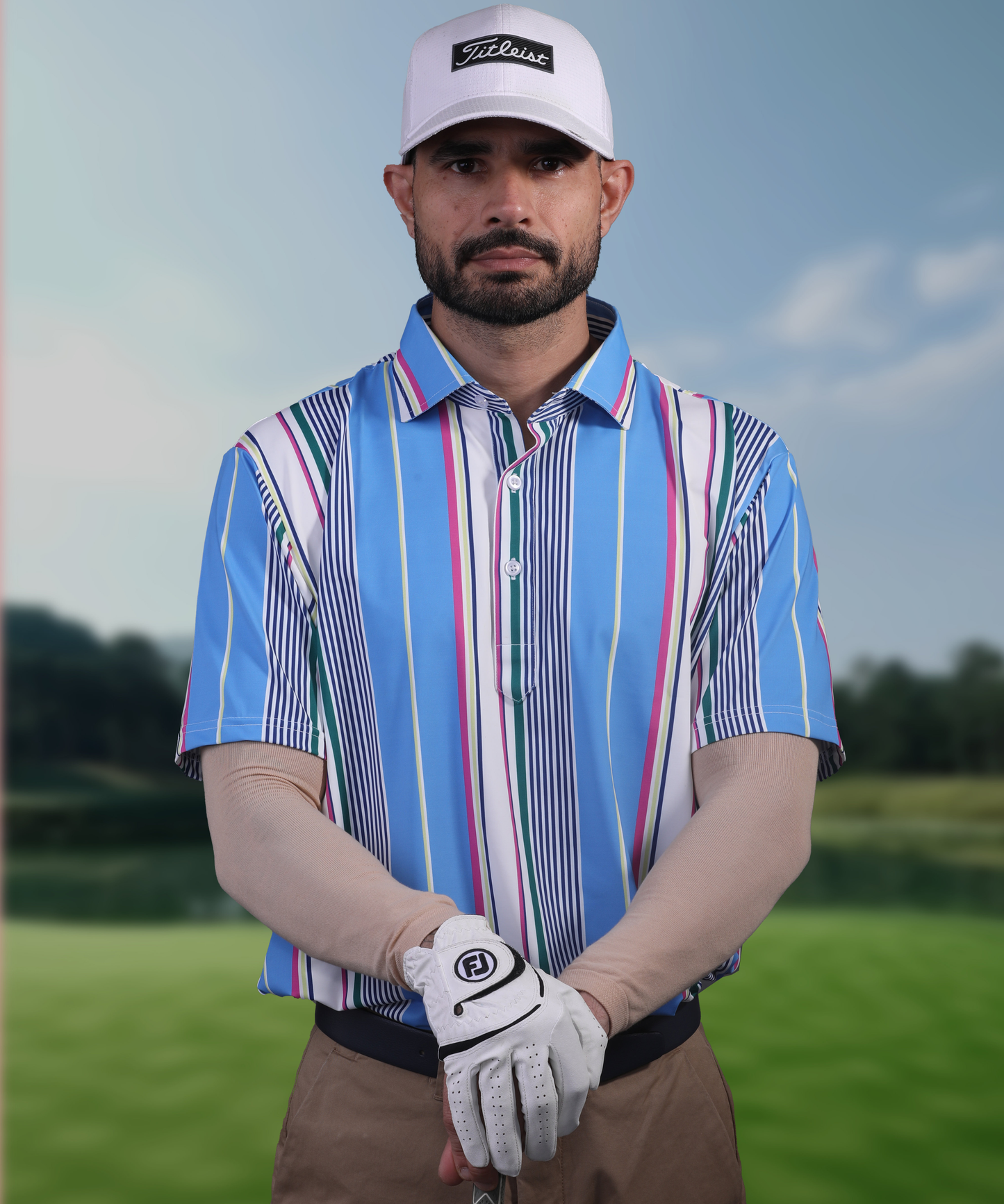 Men's DapperTee blue golf polo in stretchable polyamide for athletic performance.