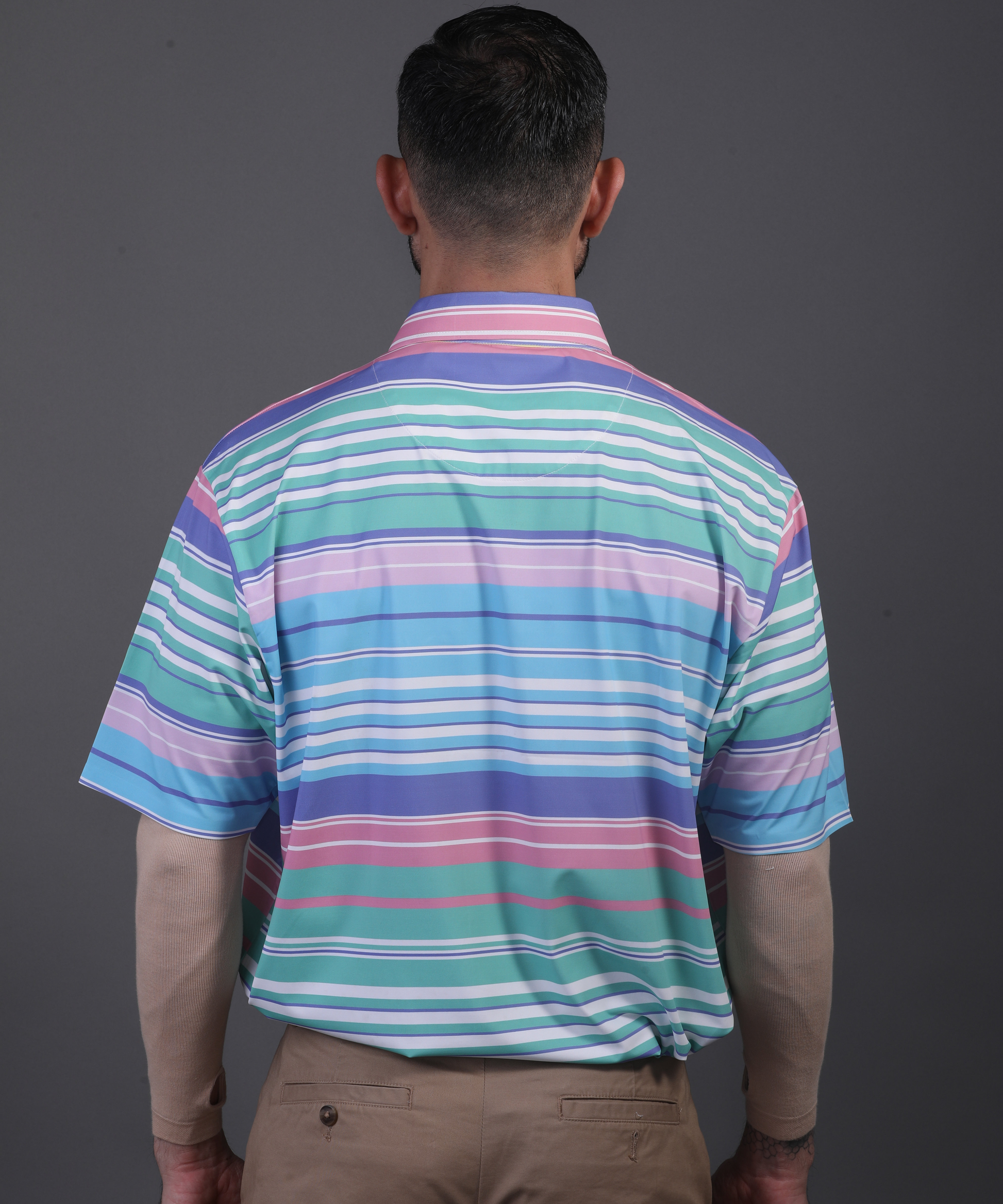 DapperTee Super Luxe polo showcasing relaxed fit for professional men’s athletic style.