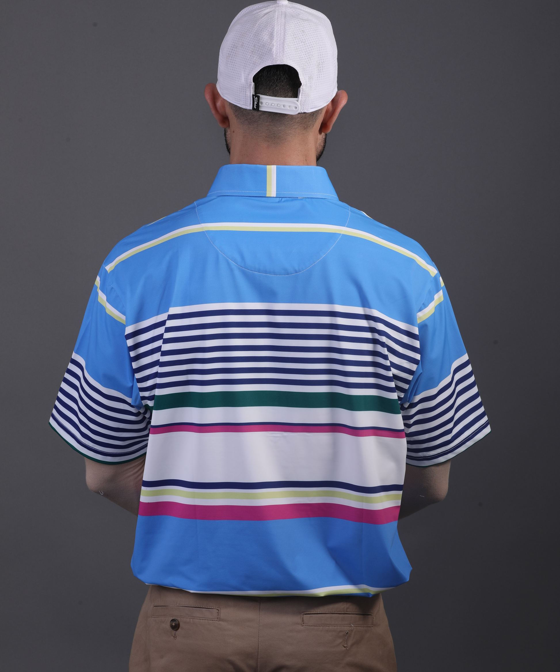 DapperTee stretchable golf polo demonstrating athletic fit and performance comfort.