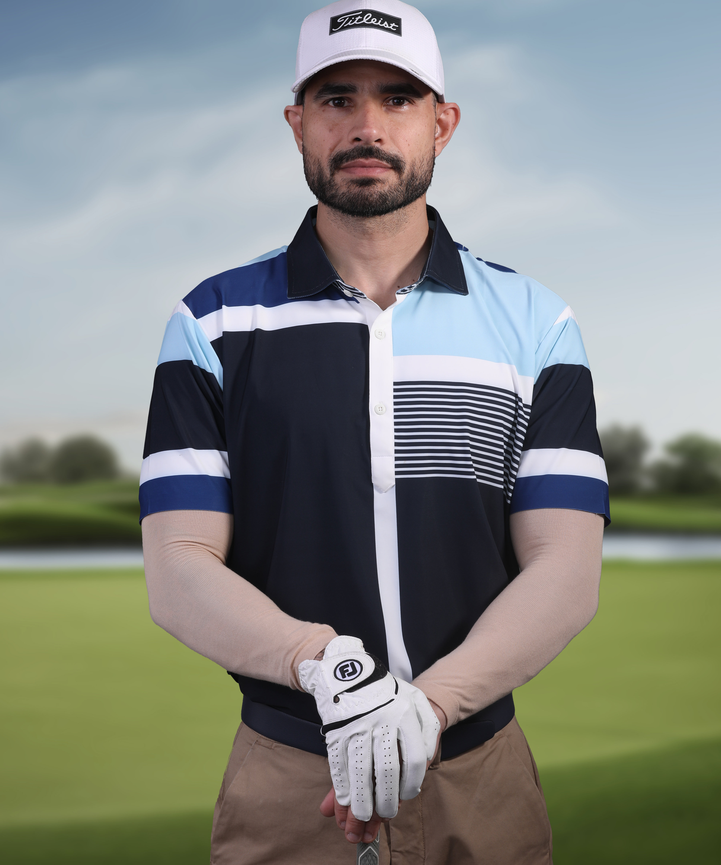 Men's DapperTee blue striped golf polo in stretchable polyamide.
