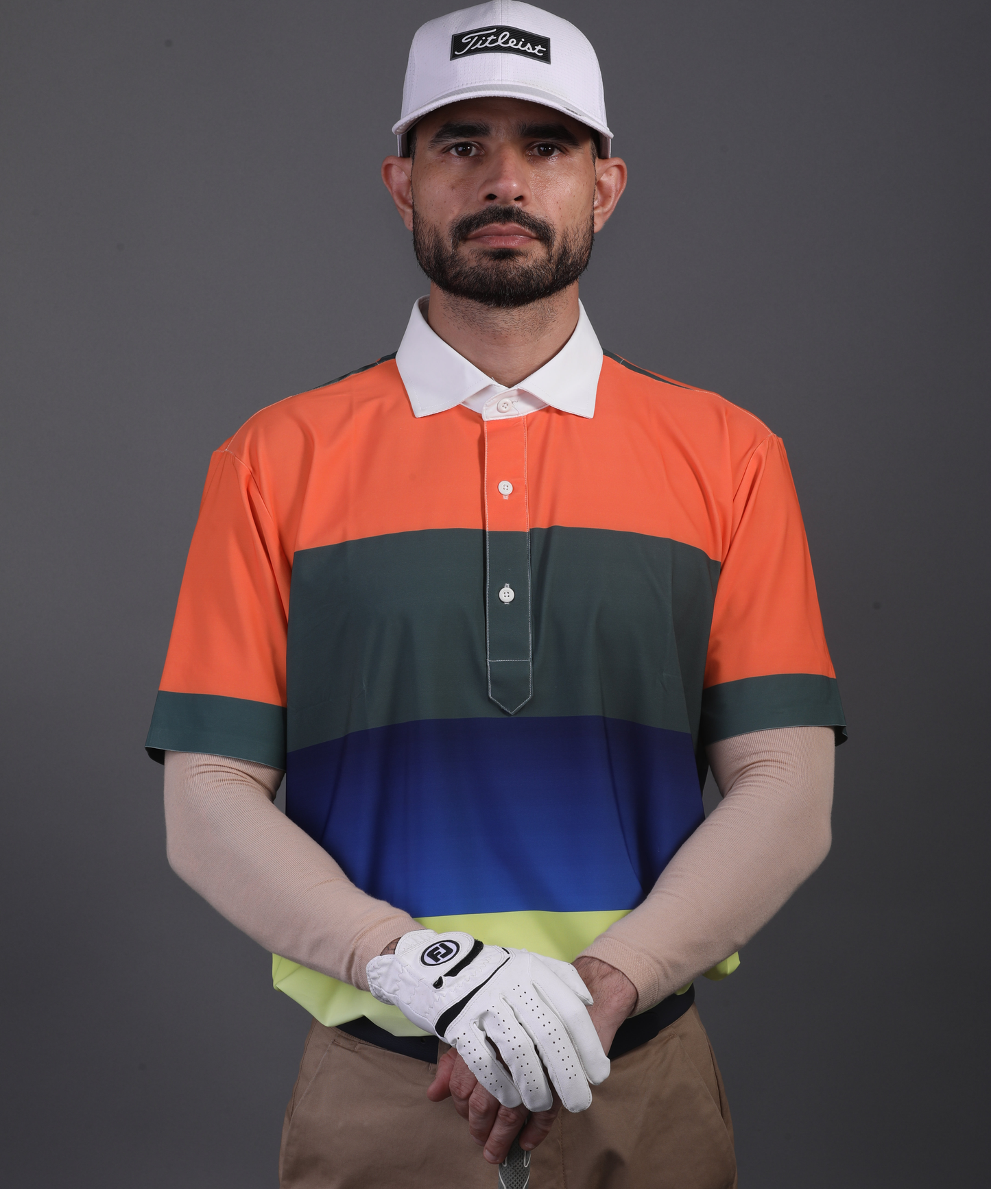 Men’s DapperTee colorful golf polo breathable polyamide fabric professional athletic performance gear.