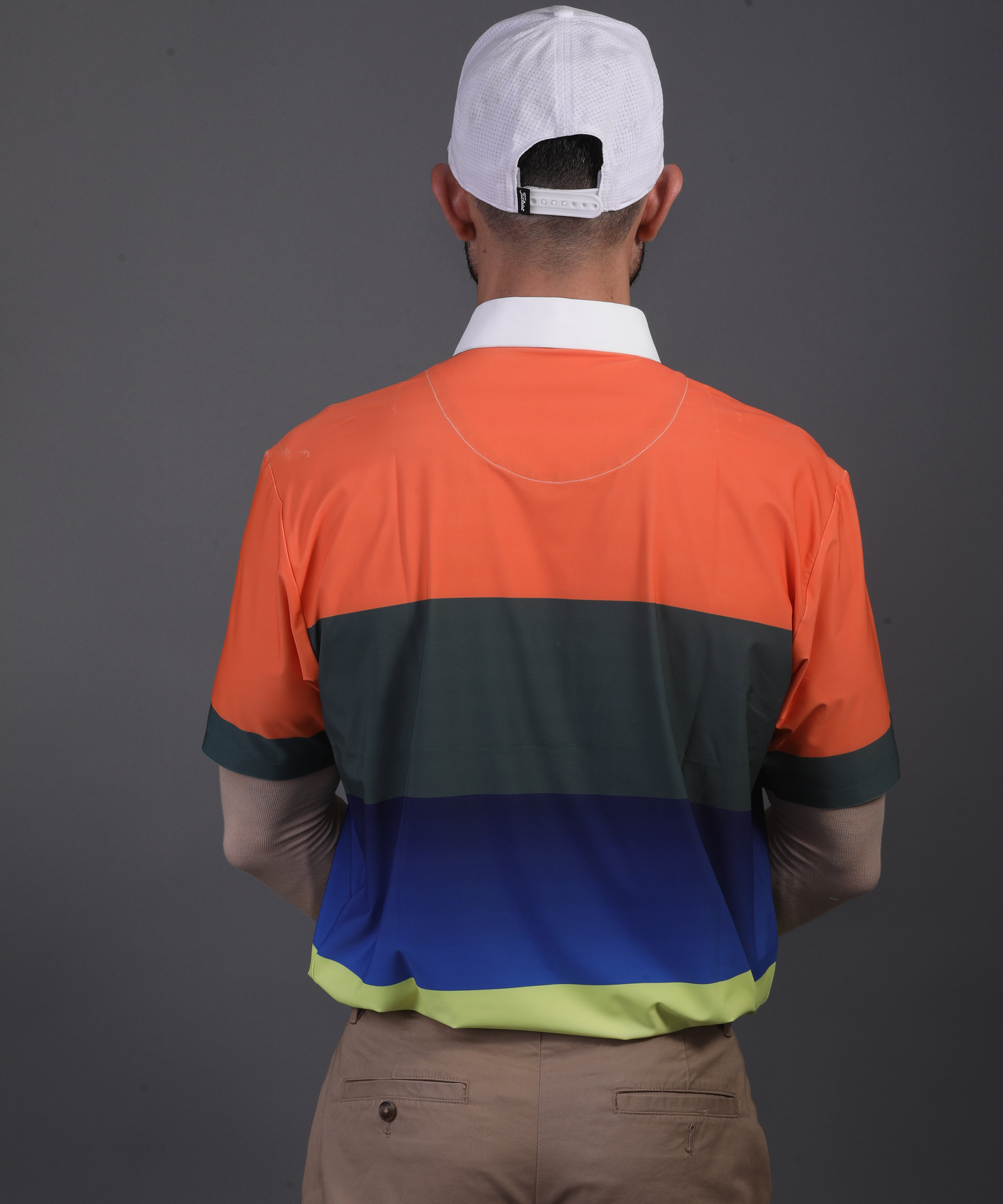 DapperTee stretchable golf polo demonstrating relaxed fit and high performance breathable polyamide.