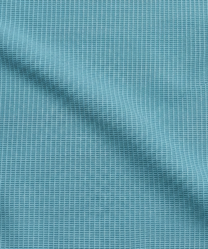 Close-up specialized jacquard polyamide fabric texture on DapperTee Super light teal shirt.
