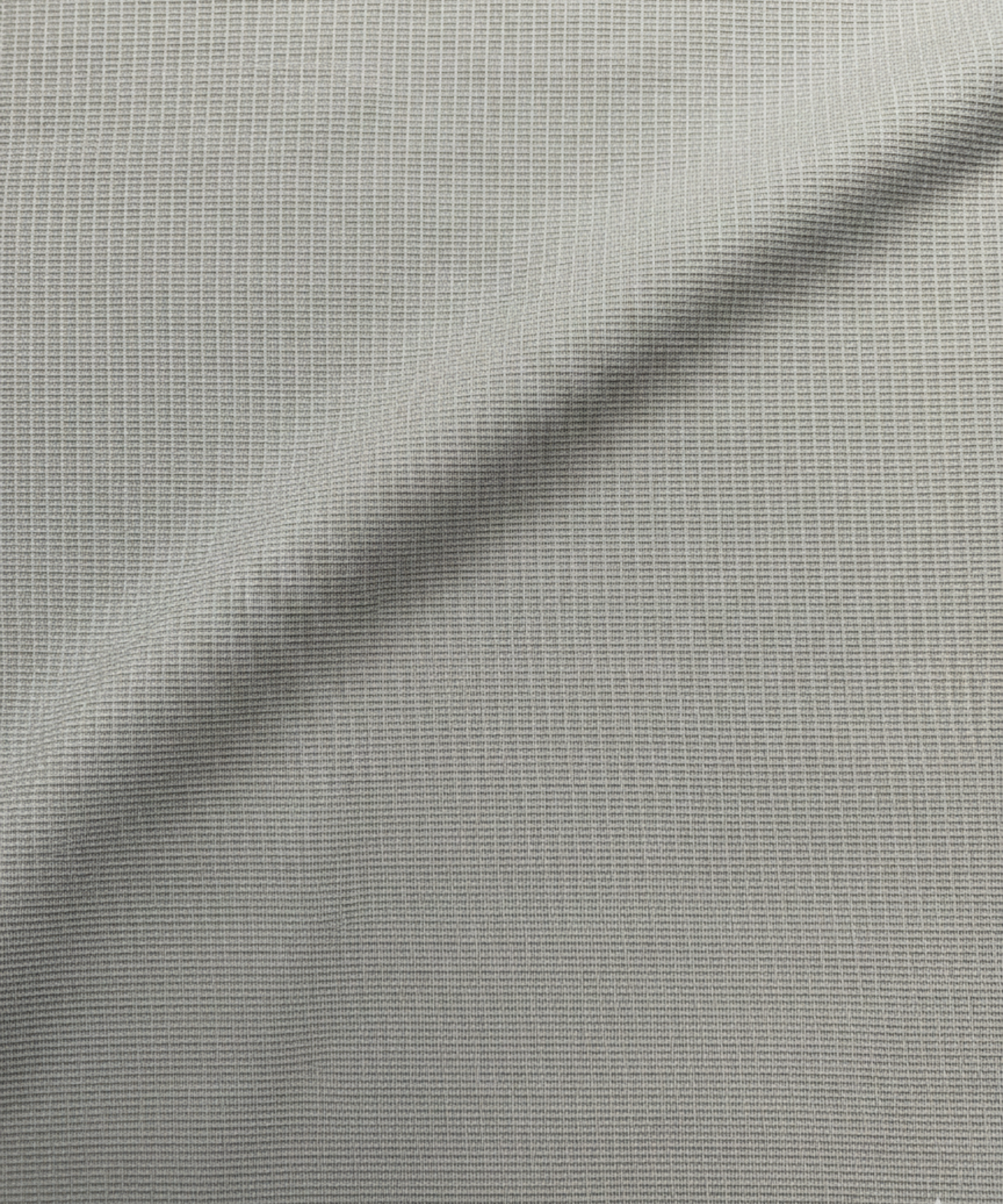 Close-up specialized jacquard polyamide fabric texture on DapperTee Fort Knox gold shirt.