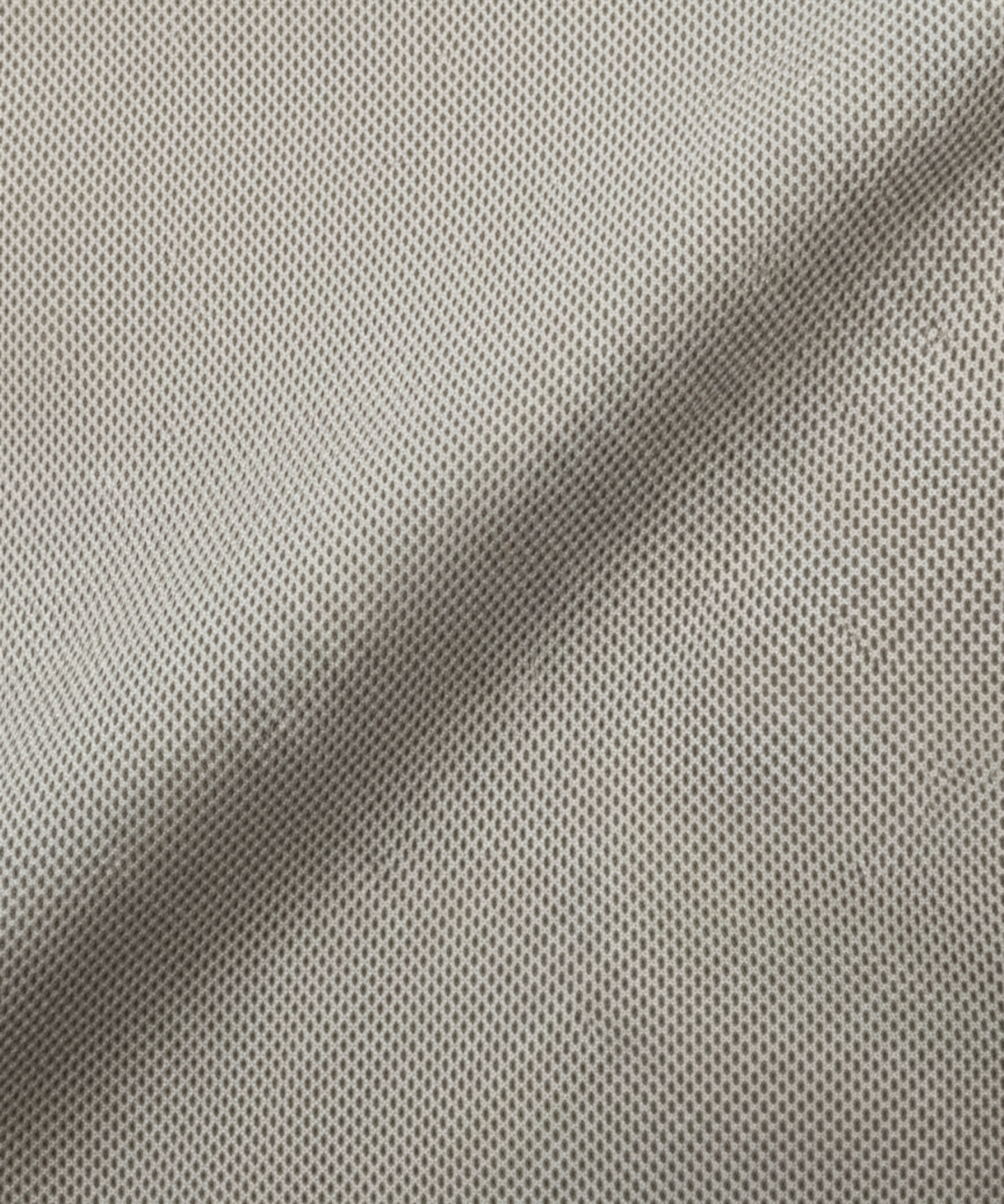 Close-up specialized jacquard polyamide fabric texture on DapperTee Netherland khaki office polo.