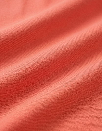 Close-up specialized polyamide fabric texture on DapperTee Japan Sun rust office polo.
