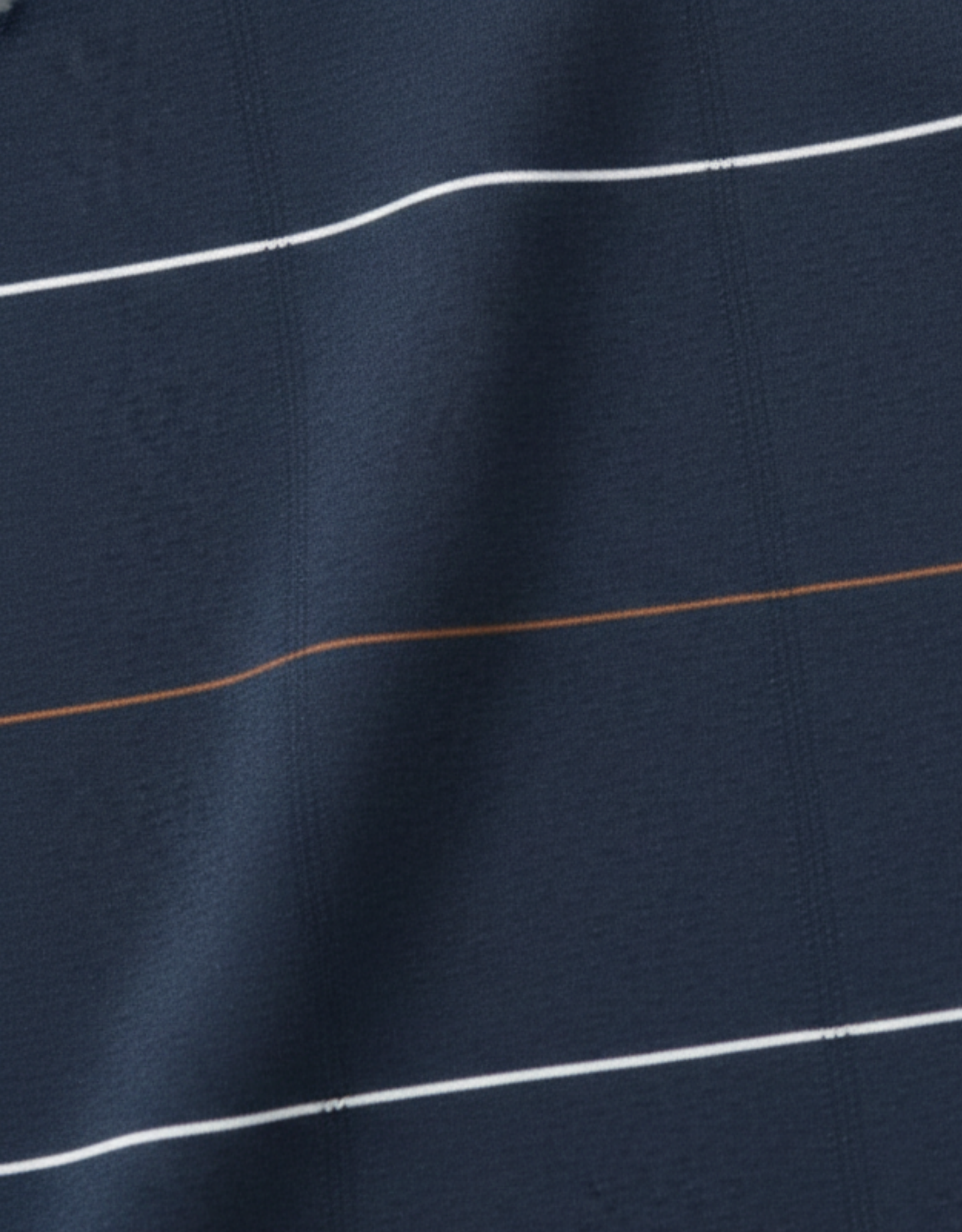 Close-up specialized polyamide fabric texture on DapperTee German dark grey striped polo.
