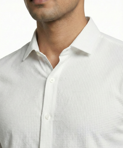 DapperTee white open polo highlighting firm collar and professional high-end tailored fit.